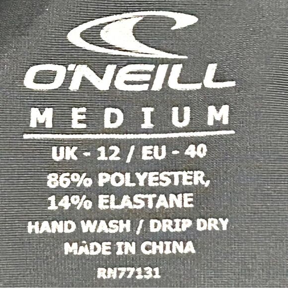 O'Neill Women's Basic Skins UPF 50+ Short Sleeve Rashguard Graphite Medium - Picture 7 of 8